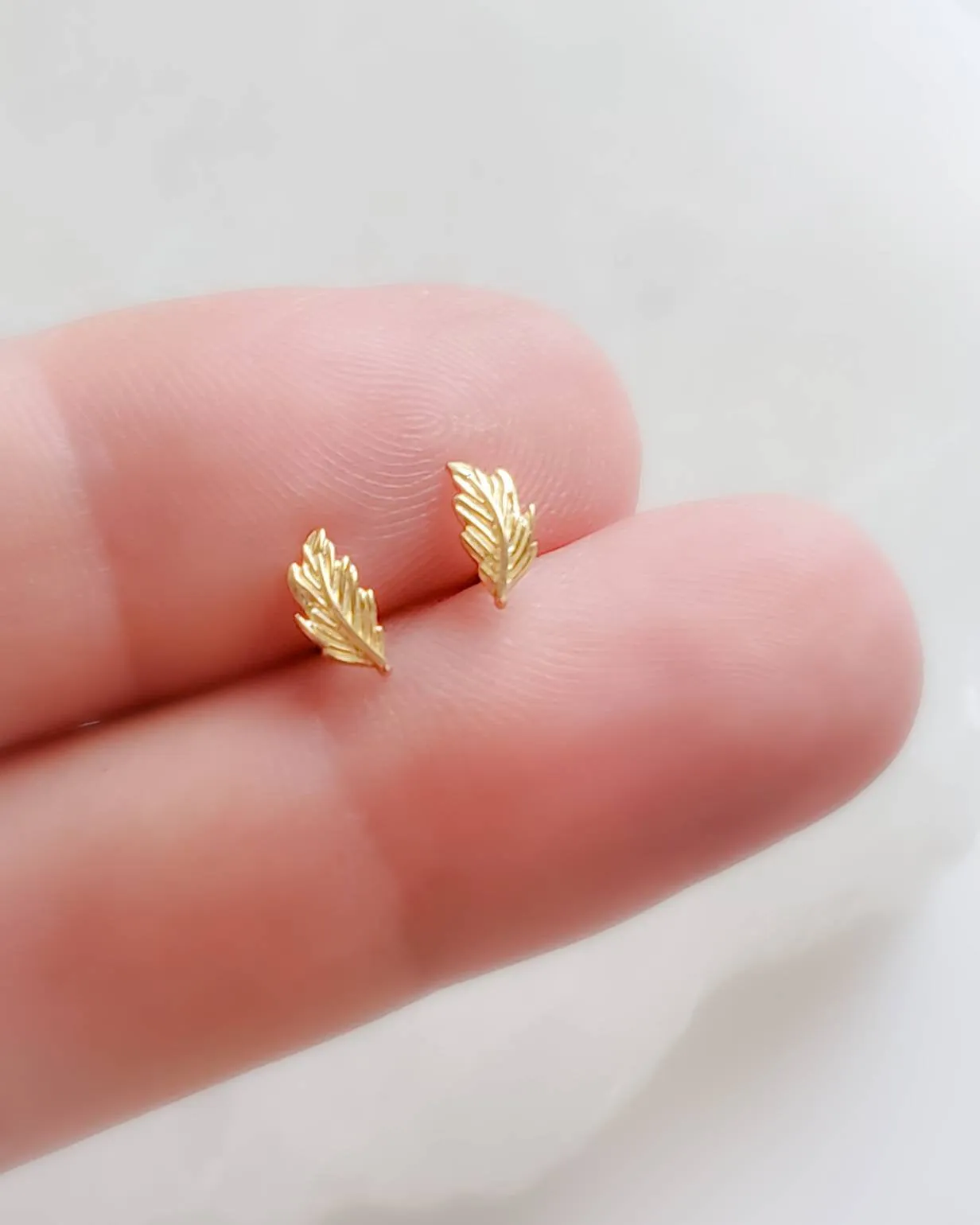 Delicate Feather Studs in 14K Gold