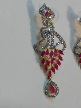 Inverted feather style pink stones earrings