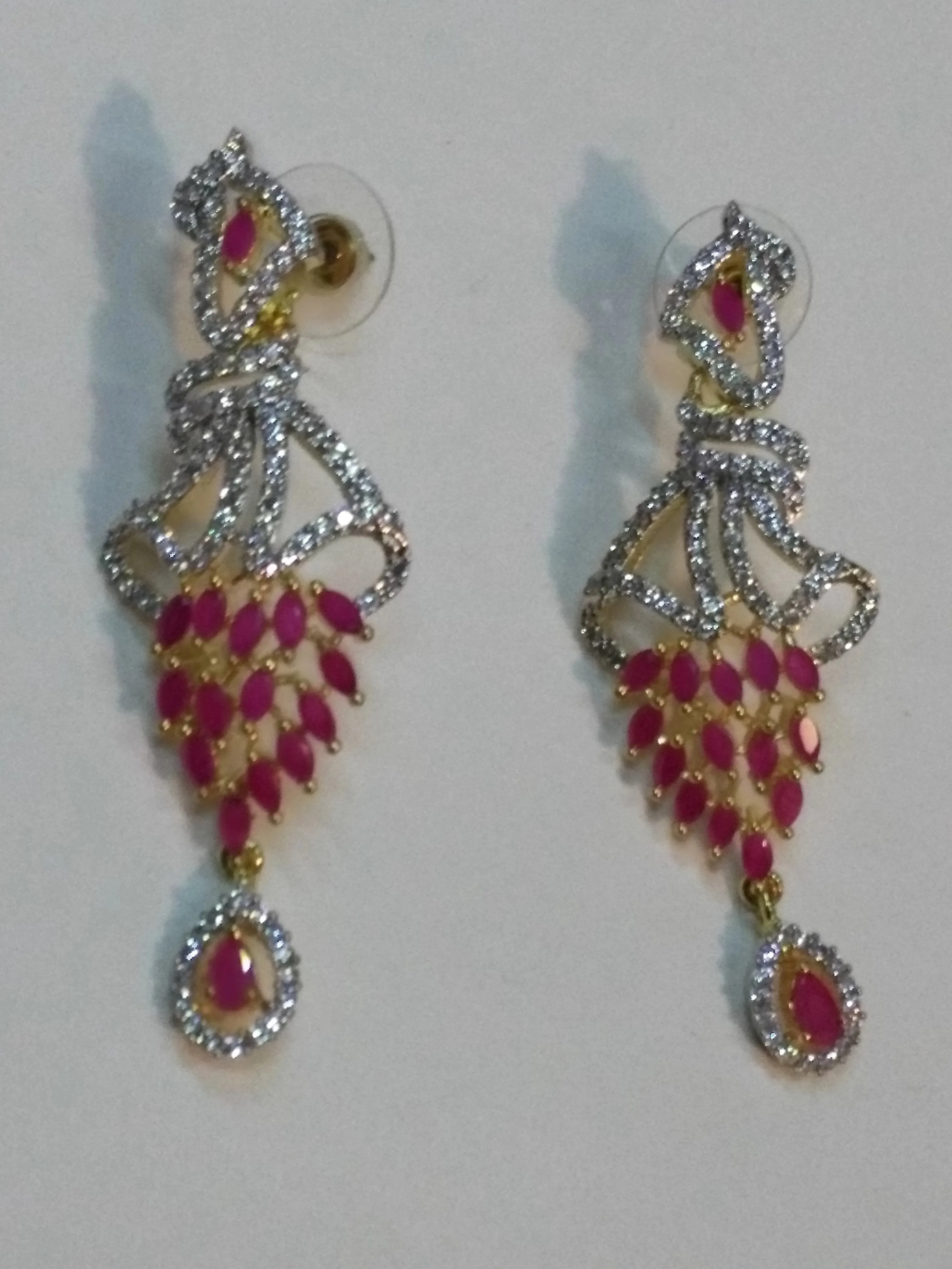 Inverted feather style pink stones earrings