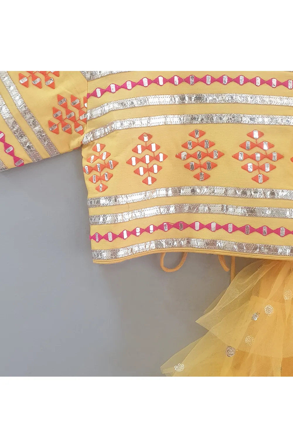 Mango yellow embroidered choli and lehenga with frilly dupatta